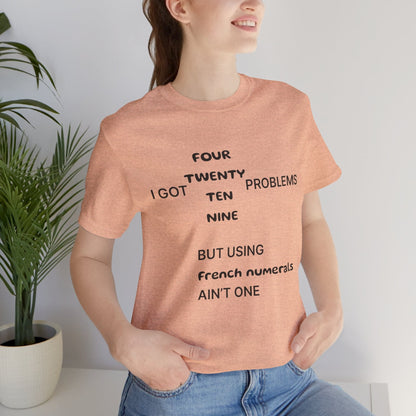 T-Shirt Heather Peach / S I got 99 problems but using French numerals ain't one T-Shirt, Unisex Jersey Short Sleeve Tee